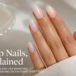 Glossy milky soap nails with a glass-like finish on almond-shaped nails