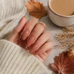 Summer to fall nails featuring a terracotta manicure with autumn styling