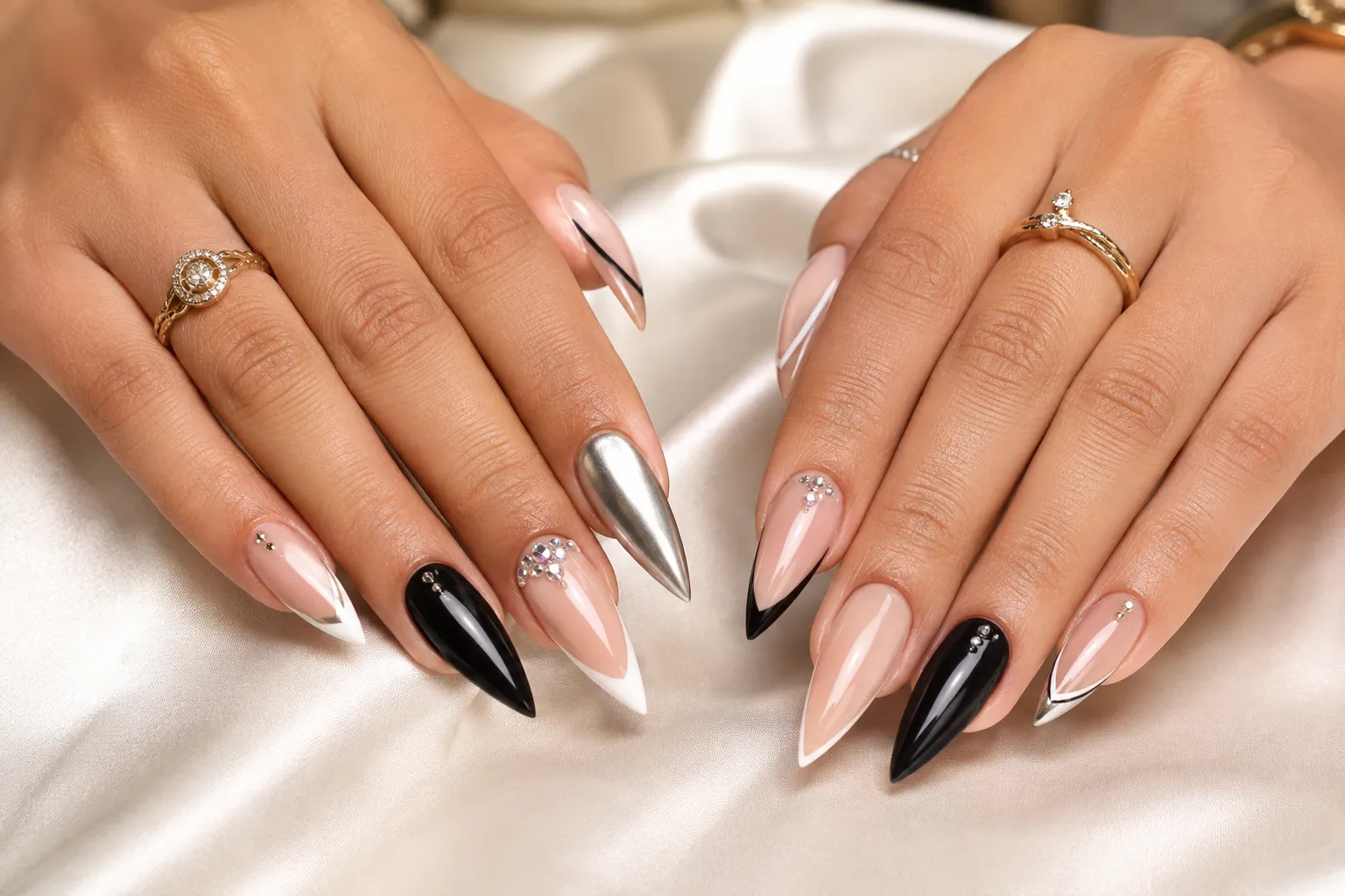 25 stunning stiletto nail ideas featuring glossy nude, black, chrome, and rhinestone designs