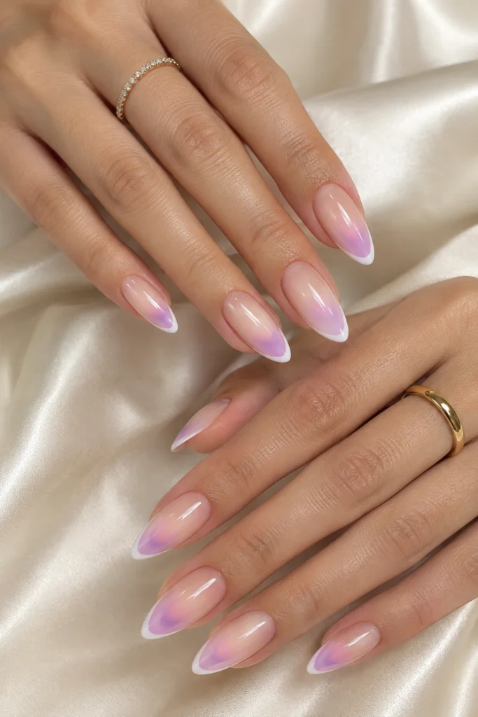 Aura French tip nails with a soft pink and white gradient