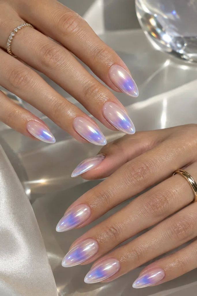 Chrome aura nails with a pearly iridescent finish