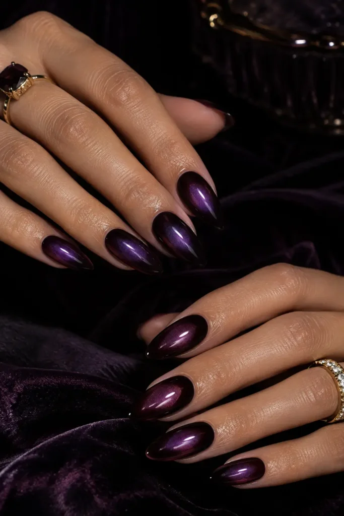 Dark aura nails with black, burgundy, and glossy gradient tones