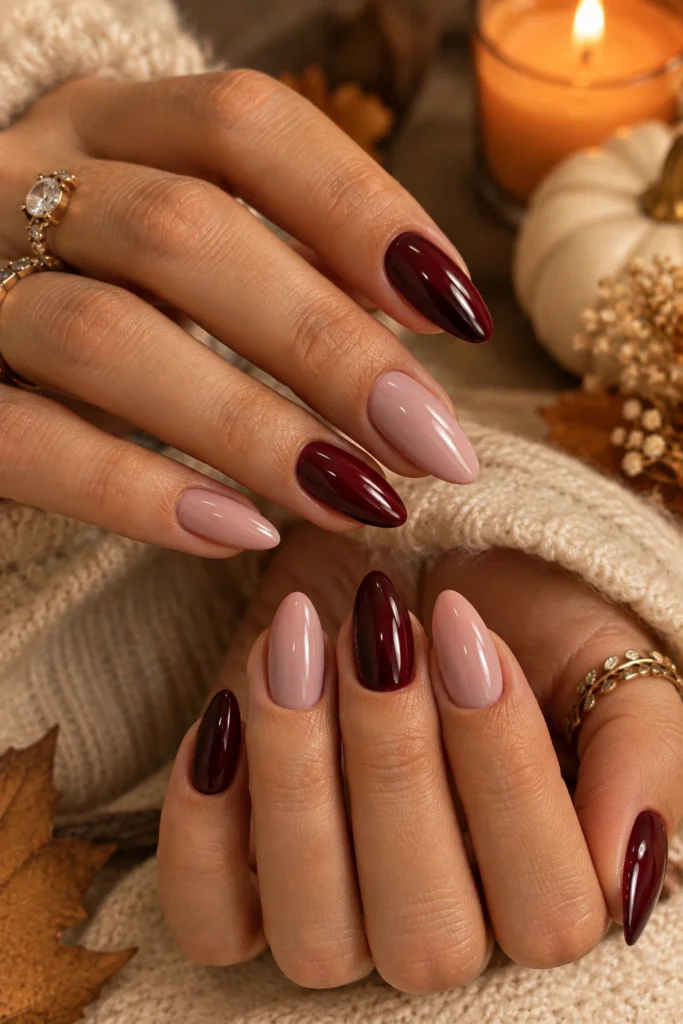 Pink fall nails with alternating pink and burgundy shades