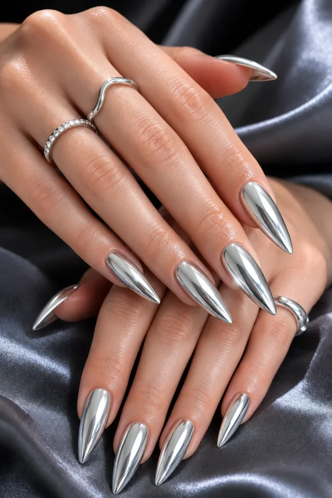 Silver chrome stiletto nail idea with a liquid-metal finish