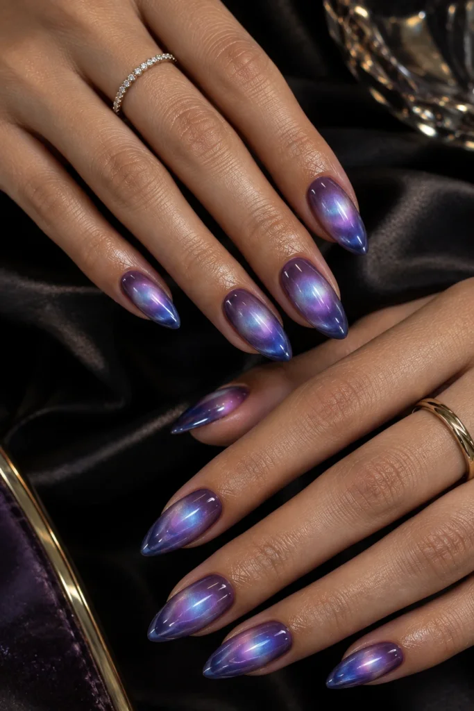 Velvet magnetic manicure with a glowing purple gradient