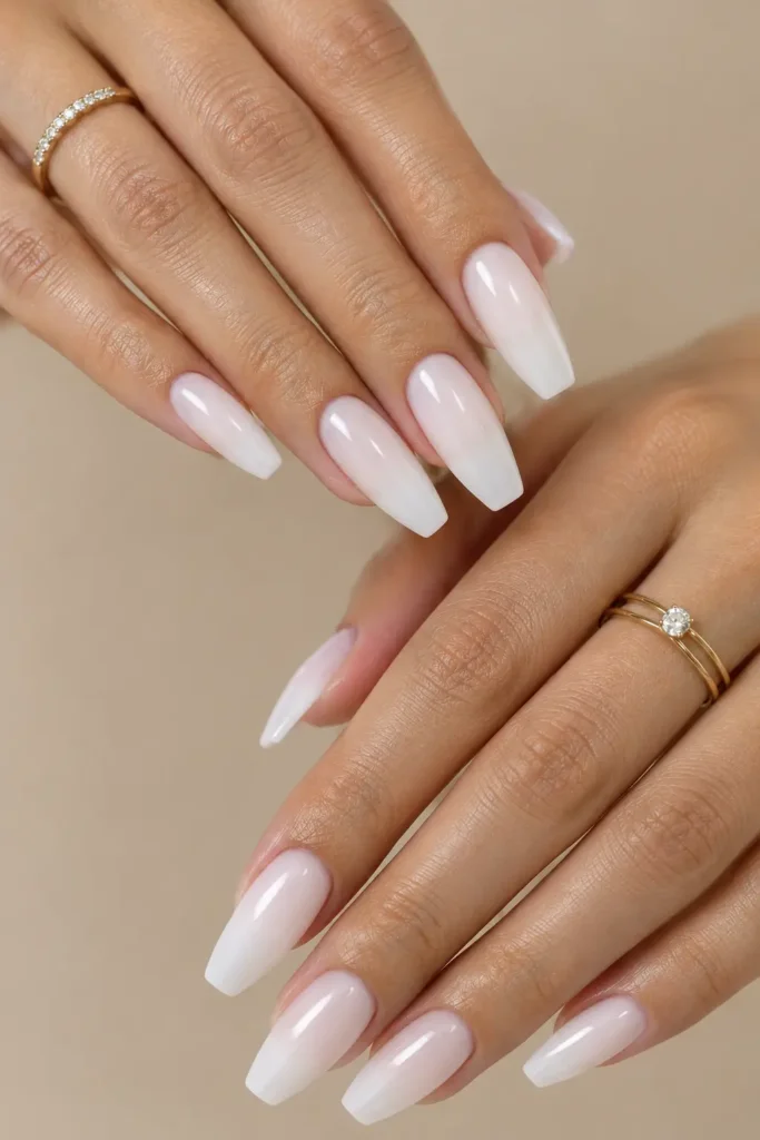 Medium coffin nails with a sheer milky white finish