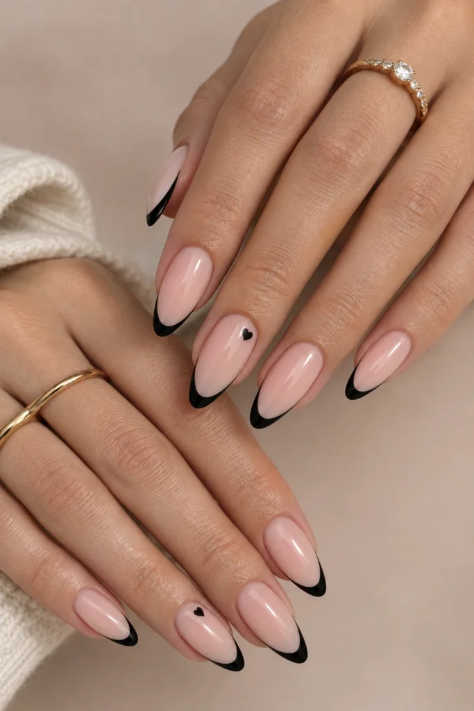 Square nails with sleek black French tips