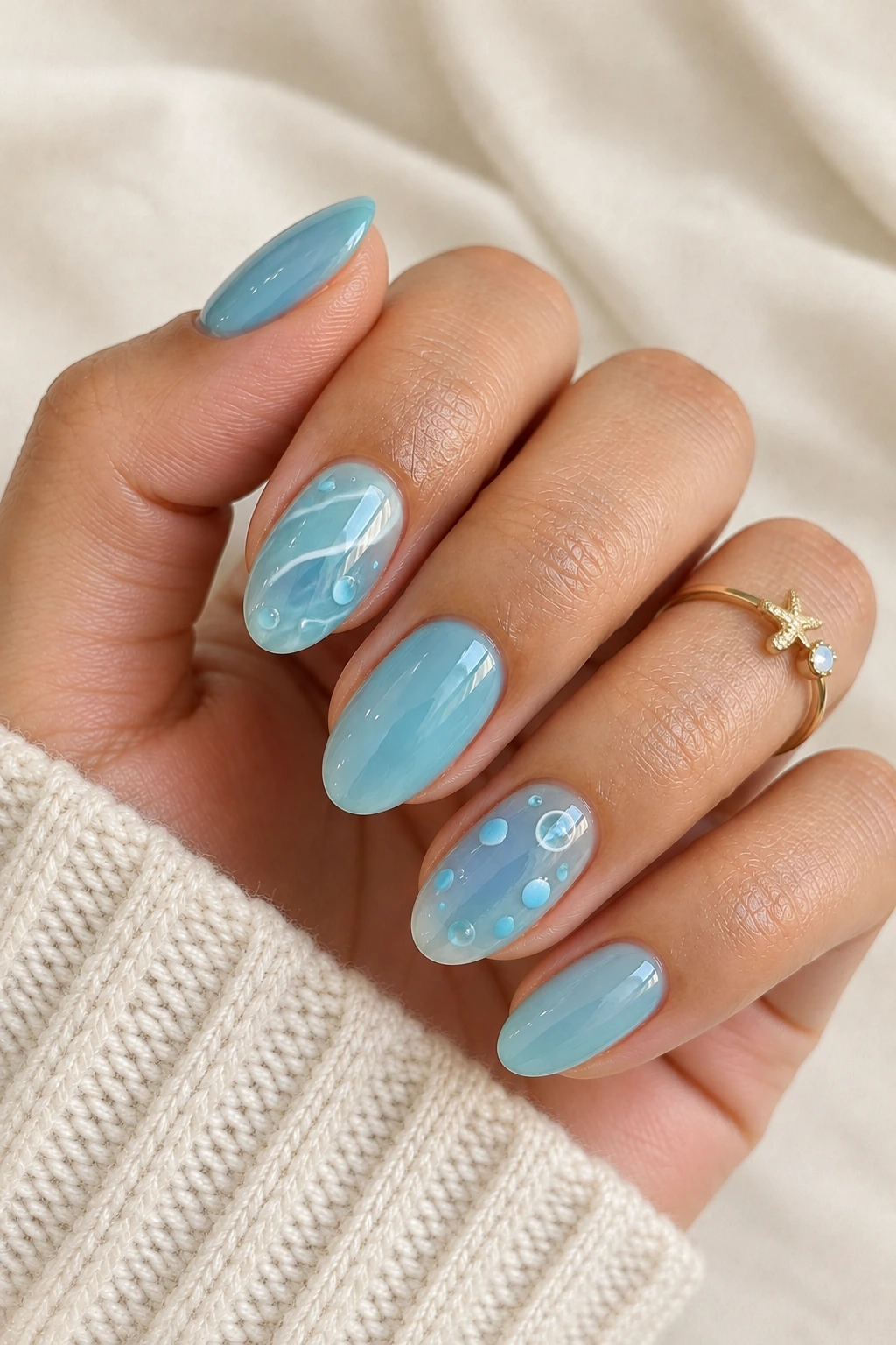 Aqua blue Squirtle nail art with playful water-inspired accents