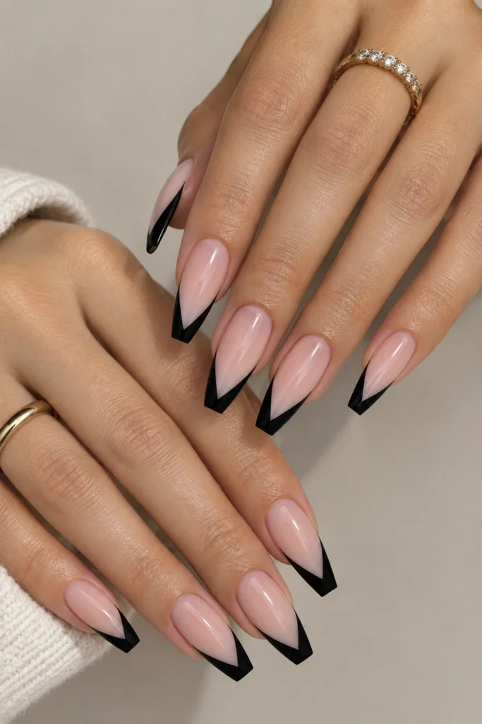 Coffin nails with geometric black V-shaped tips