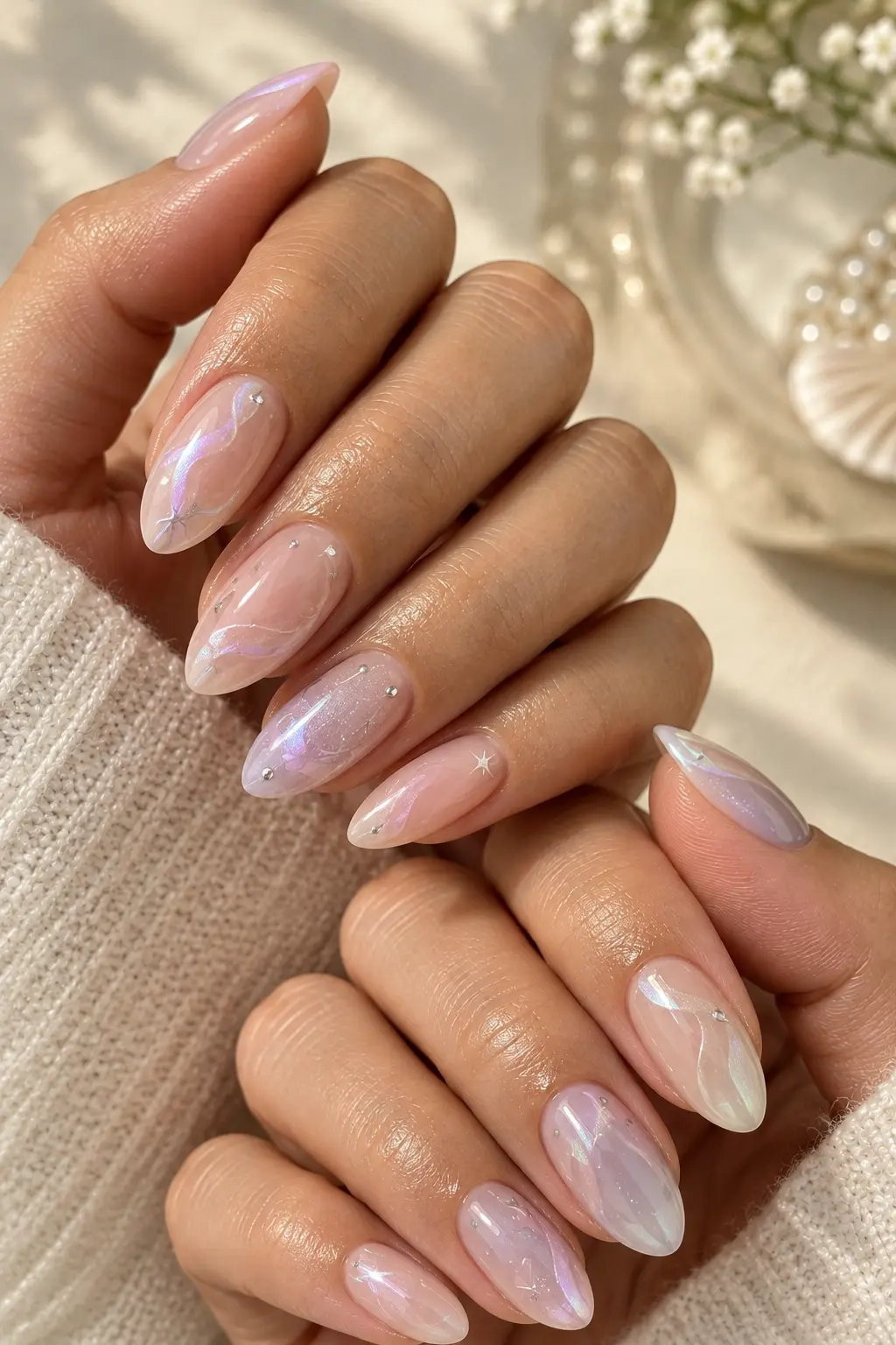 Pastel pink Mew-inspired manicure with soft, dreamy accents