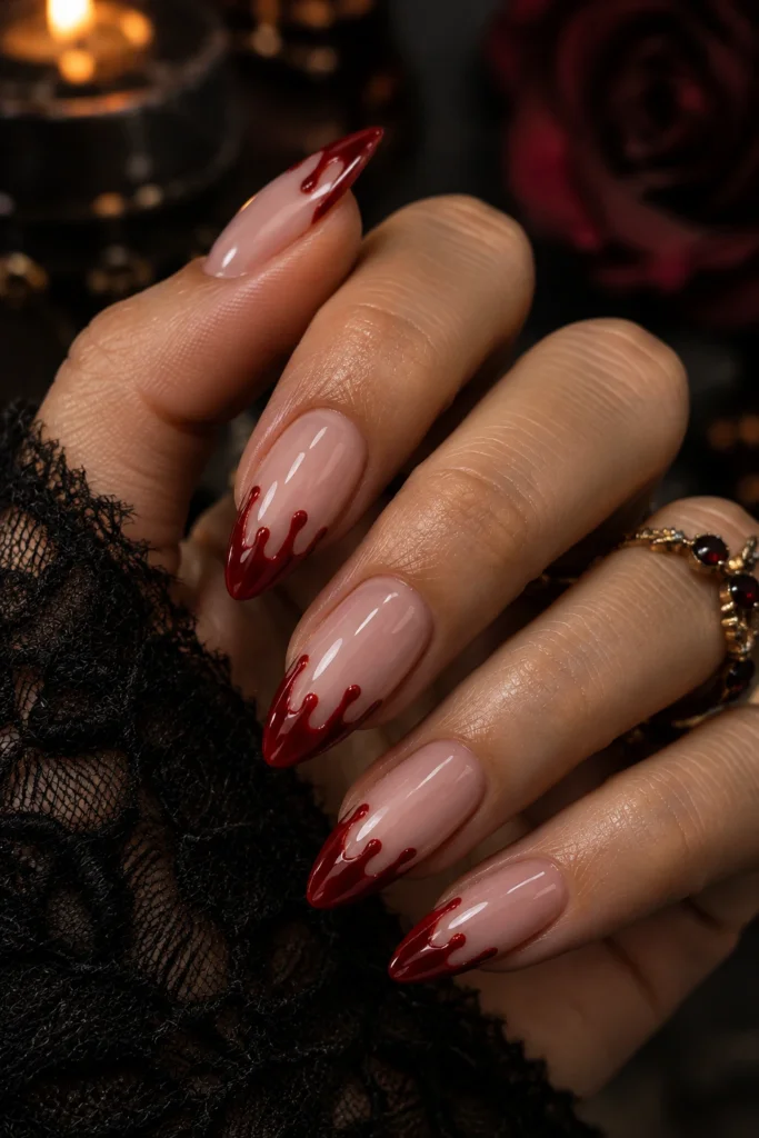 Almond nails with deep cherry-red drip tips